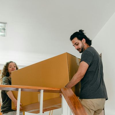 A group moving in sync in a spacious, sunlit room.