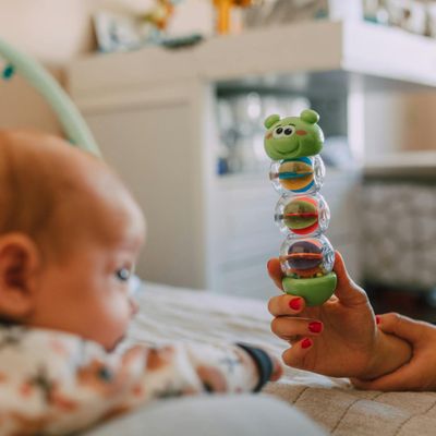 A person holding a steady pose, showing gentle strength.